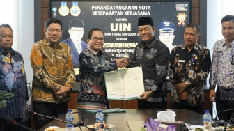 Pemkab Merangin Teken MoU dengan UIN STS Jambi